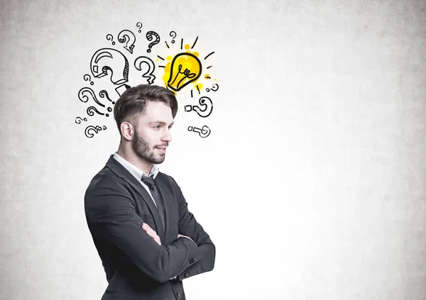 Pensive bearded businessman, questions lightbulb — Stock Photo, Image