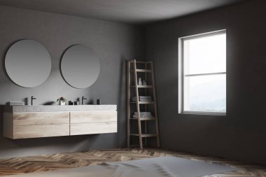 Bir yuvarlak ayna banyo köşesinde