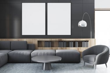 Beton duvar oturma odasında gri kanepe