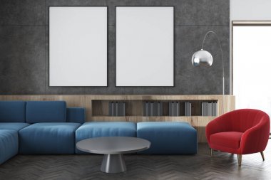 Beton duvar oturma odasında mavi kanepe