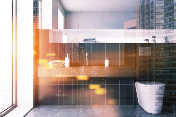 Black tiled bathroom interior toned — Stock Photo, Image