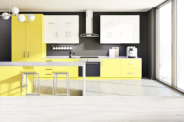 Gray kitchen, yellow counters, table blur — Stock Photo, Image