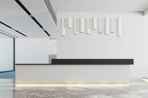 White office, white and black reception desk