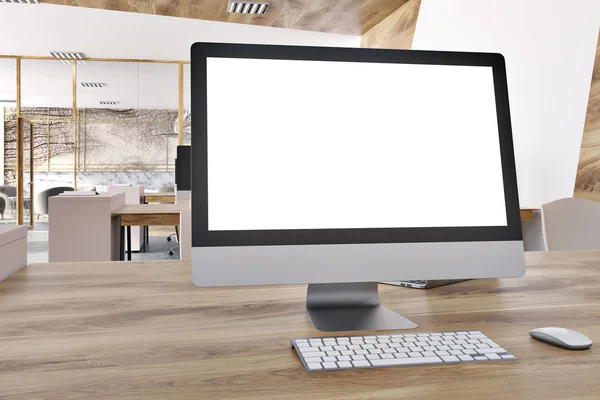 Blank computer screen in a marble office