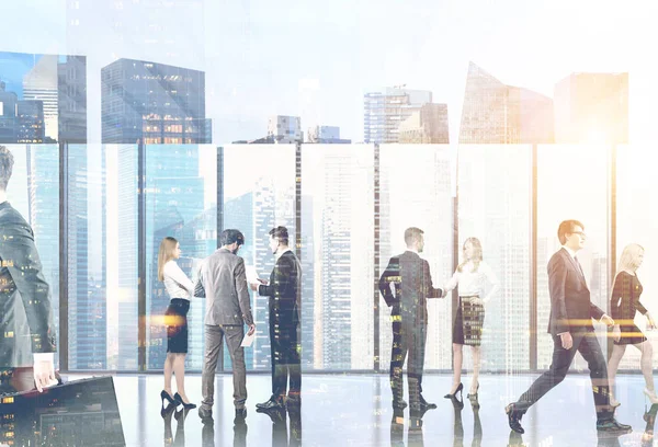 Business people in their office lobby, city sun — Stock Photo, Image