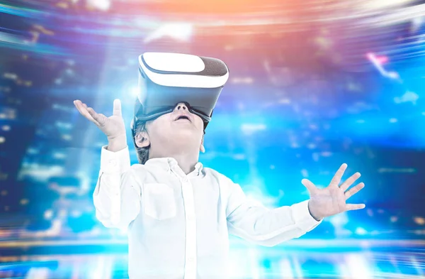 Cute little boy in VR glasses futuristic interface — Stock Photo, Image