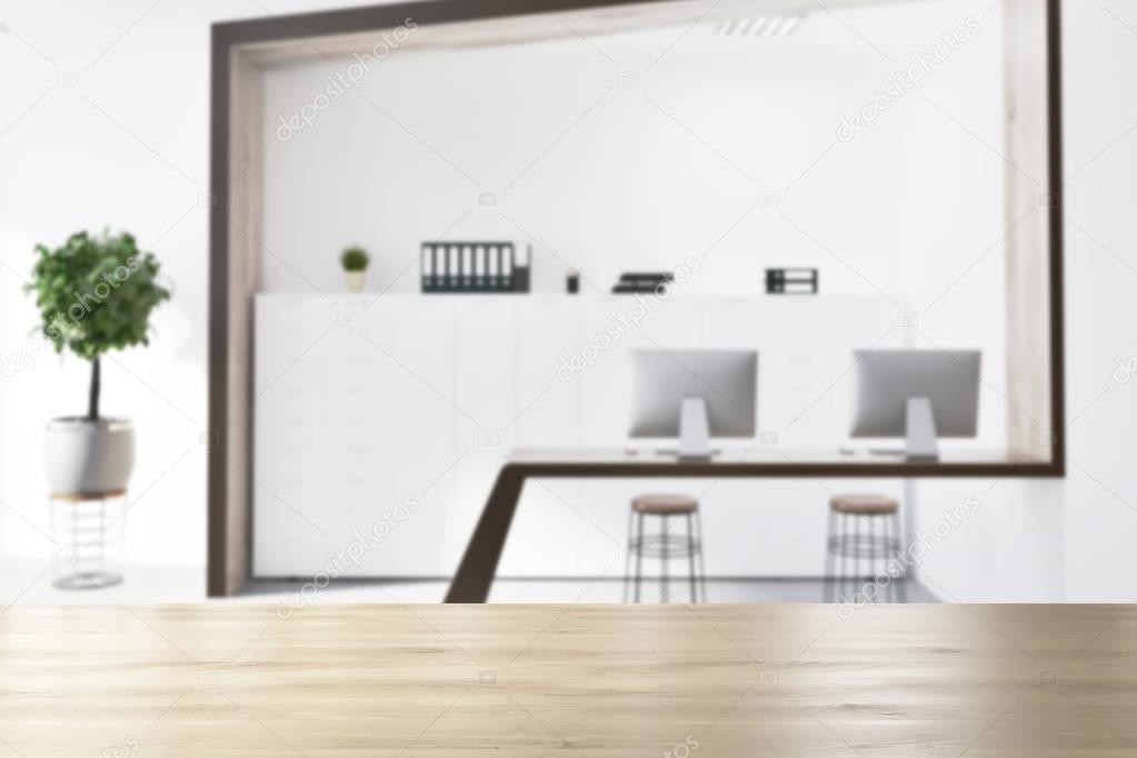 White modern workplace interior blur
