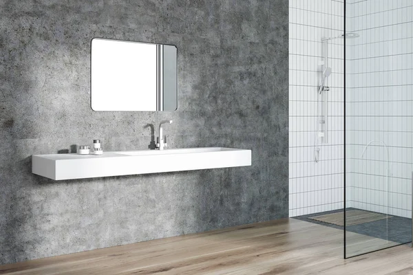 Concrete bathroom corner, sink and shower