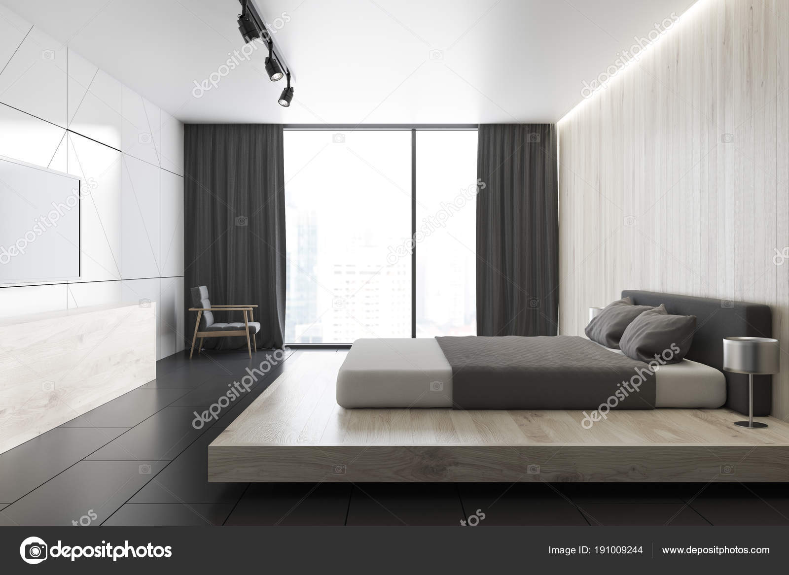 White Loft Bedroom With A Tv Set A Side View Stock Photo