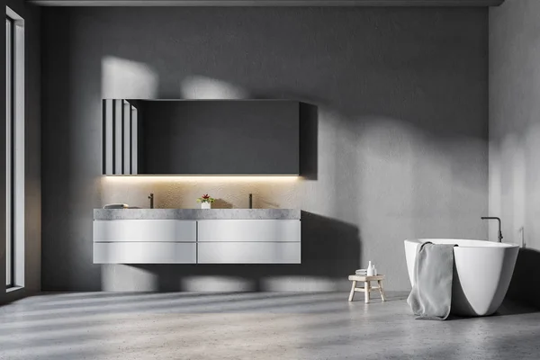 Front view of double sink gray bathroom with tub — Stock Photo, Image