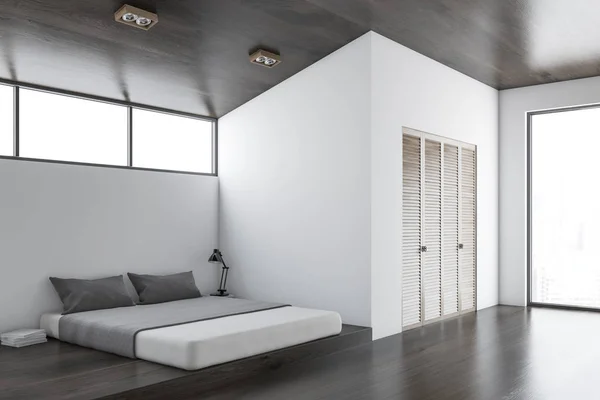 Bílé a tmavé dřevěné ložnice roh — Stock fotografie