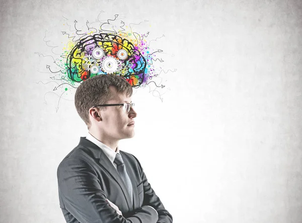 Confident cross armed businessman, cog brain — Stock Photo, Image