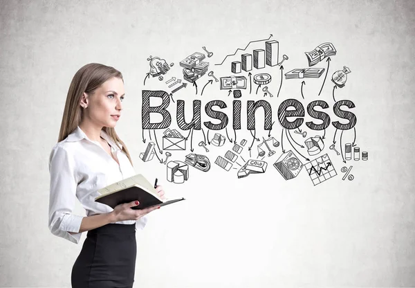 Blond affärskvinna med en anteckningsbok, business — Stockfoto