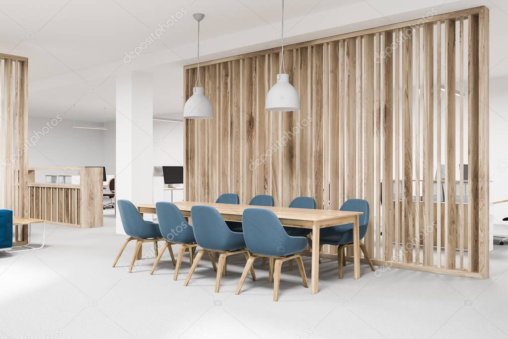 Wooden meeting room corner, blue chairs