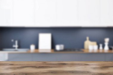 Gri mutfak tezgahı ile aletleri ve onları asılı beyaz dolapları bir dizi inşa. Çerçeveli bir poster. 3d render alay kadar bulanık