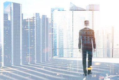 Arkadan görünüş bir işadamı bir modern şehir ofisine bir çanta. Cityscape. Liderlik kavramı Toned görüntü çift pozlama kadar sahte