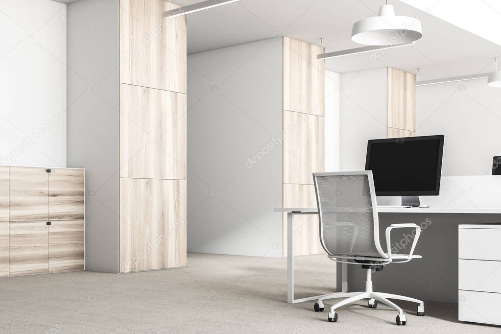 Modern office corner with white and wooden walls, a concrete floor and rows of computer tables. Columns 3d rendering mock up
