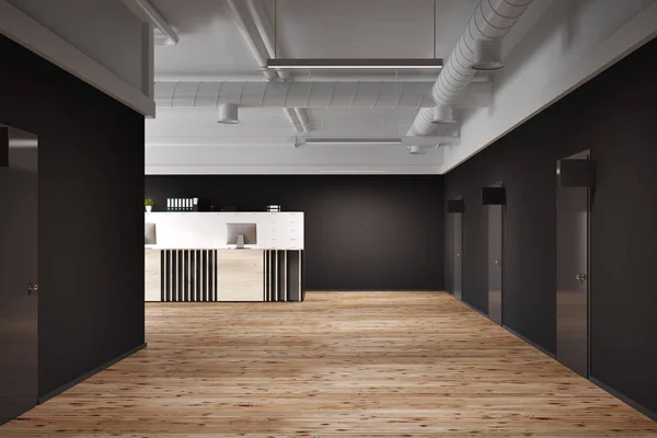 Black office corridor, wooden reception table — Stock Photo, Image