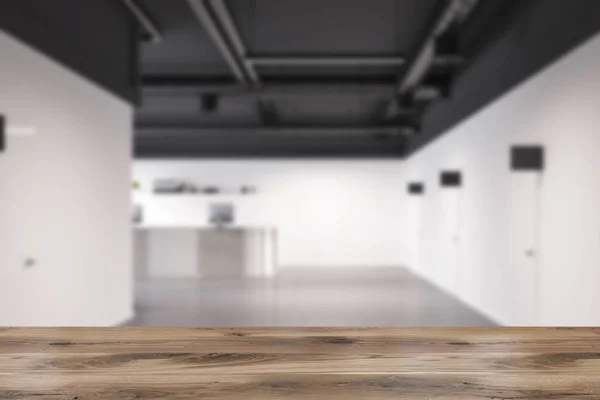 Black office corridor, wooden reception blur — Stock Photo, Image
