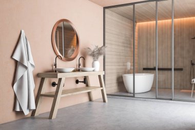 Küvetli ve lavabolu bej banyo köşesi