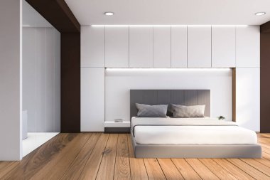 Front view of white and wood bedroom with bathroom
