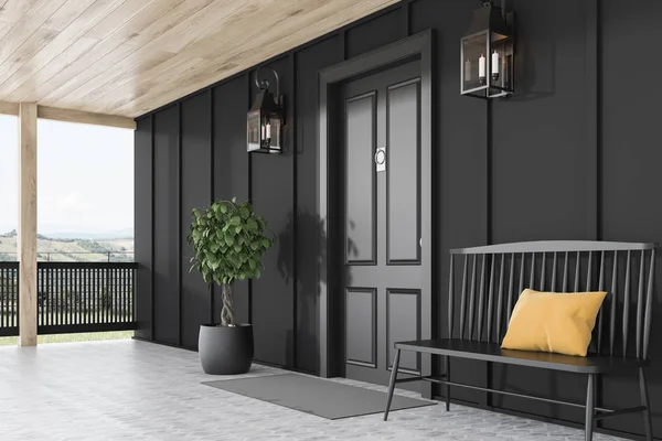 Черная входная дверь черного дома, скамейка, вид сбоку — стоковое фото