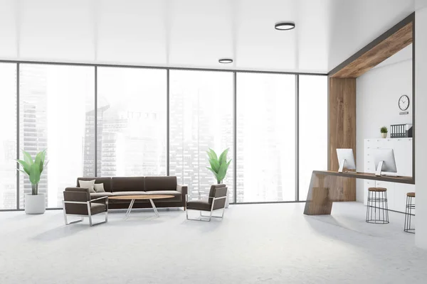 Witte kantoor wachtkamer met bruine bank — Stockfoto