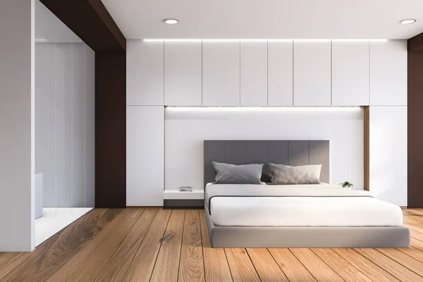 Front view of white and wood bedroom with bathroom — Stok fotoğraf