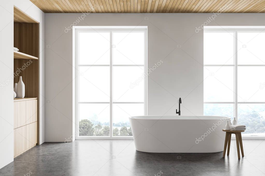 Stylish white bathroom interior with cabinet