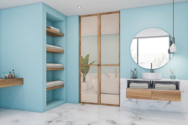 Beyaz mermer ve mavi banyo köşesi