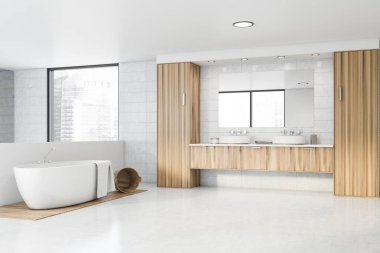 Beyaz fayanslı banyo köşesi, lavabo ve küvet