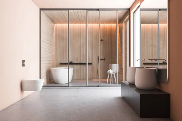 Salle de bain beige avec lavabo massif et toilettes — Photo