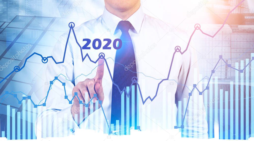 Businessman working with 2020 graph