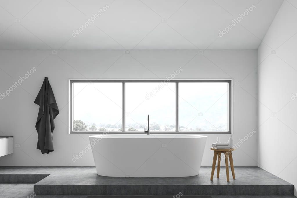 White bathroom interior with bathtub