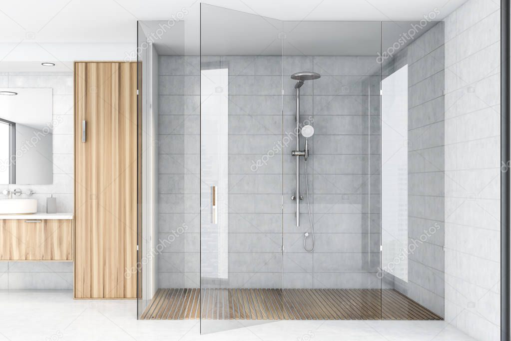 White tile bathroom interior with shower