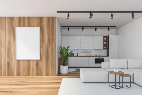 Белая и деревянная кухня с диваном и постером — стоковое фото