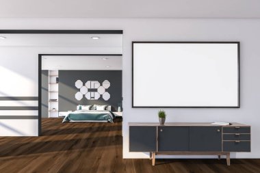 Dolabı ve posteri olan gri yatak odası.