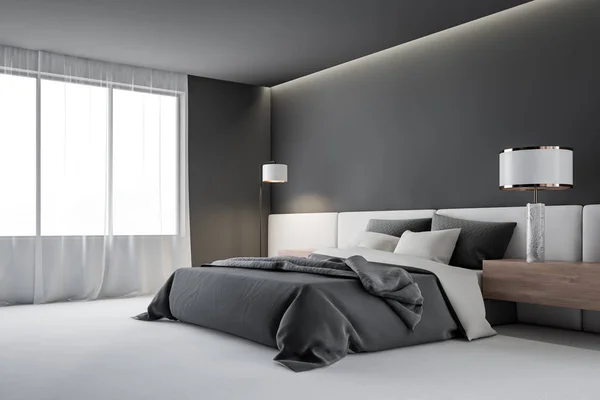 Graue Schlafzimmerecke mit Lampe — Stockfoto