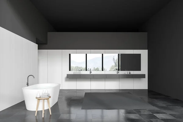 Baño blanco y negro con bañera y lavabo — Foto de Stock