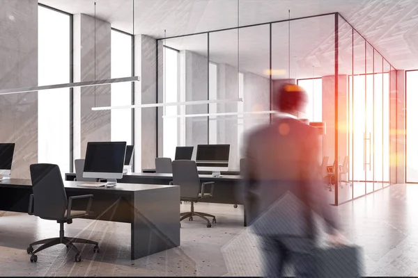 Businessman entering white open space office — Stock Photo, Image