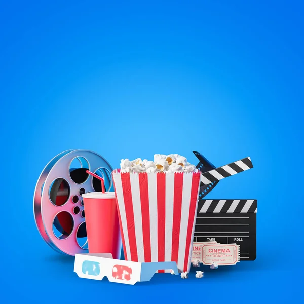 Popcorn, clapper and film reel on blue, mock up — Stock Photo, Image