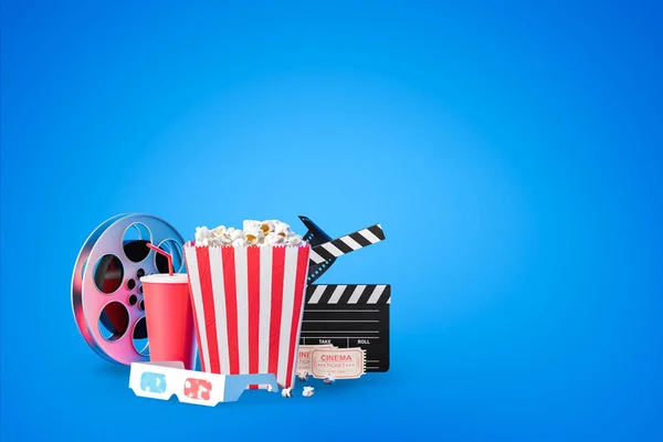Popcorn, clapper board en film haspel op blauw — Stockfoto