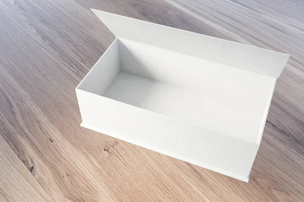 Puste białe pudełko na drewnianym stole — Zdjęcie stockowe