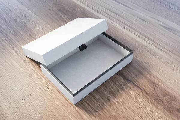 Caja de regalo blanca abierta en mesa de madera — Foto de Stock