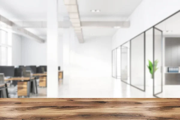 Table in blurry white industrial style office — Stock Photo, Image