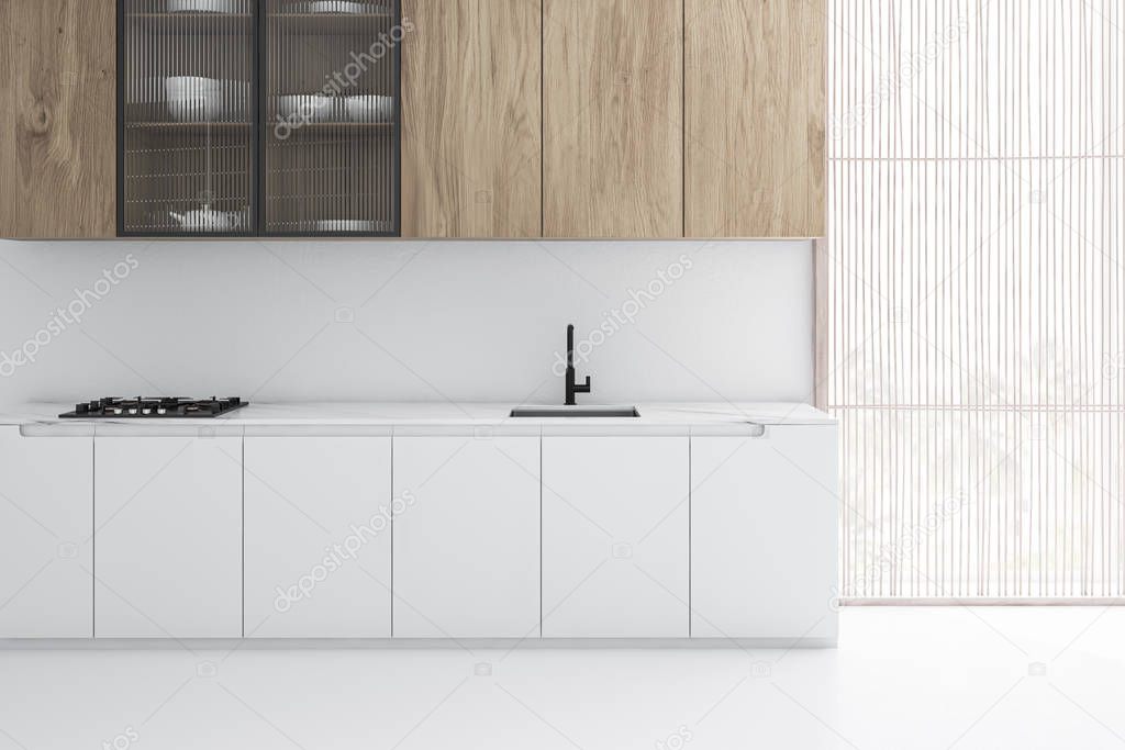 White kitchen interior with wooden cupboards