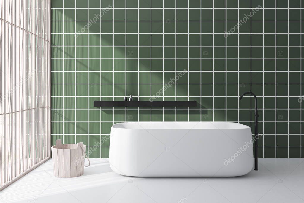 Green tile bathroom interior with tub