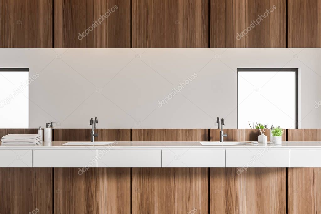 Close up of double sink in modern bathroom