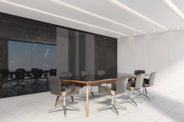 Siyah mermer ve beyaz konferans salonu köşesi.