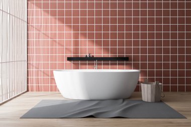 Küvetli turuncu fayanslı banyo.